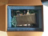 A polished TurboKraft longneck intercooler package boxed up in 2in thick foam for safety, with various components laid out, including tubing and hardware.